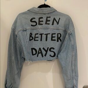 Vintage Light Blue Cropped Denim Jacket “seen better days” on the back